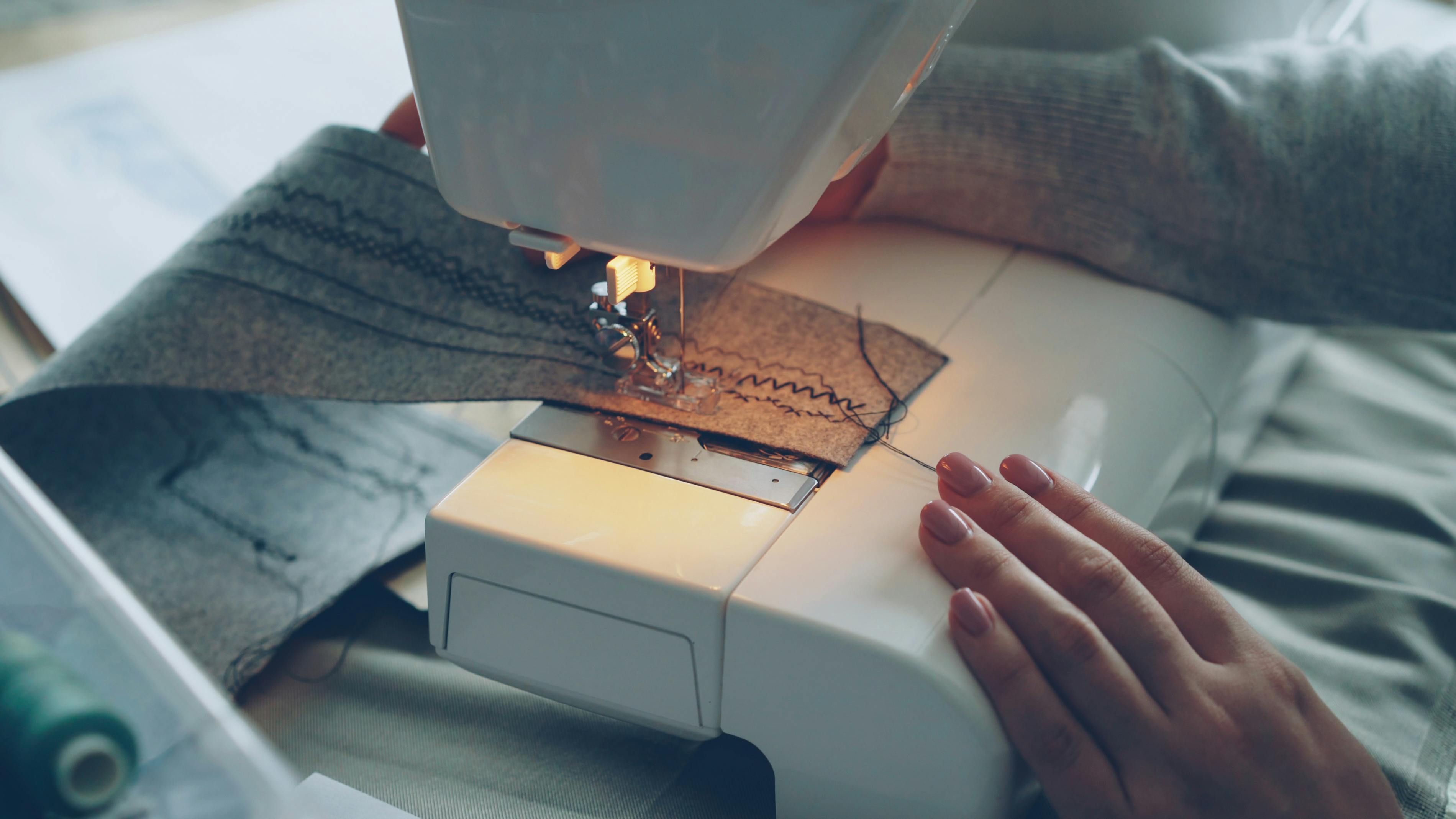 Garment being stitched on a Luxxe factory machine